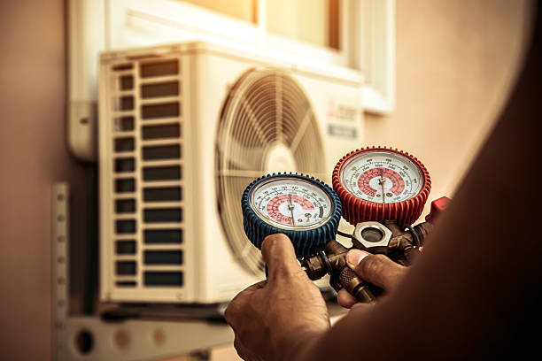Professional Hvac technician working in Highland, MD